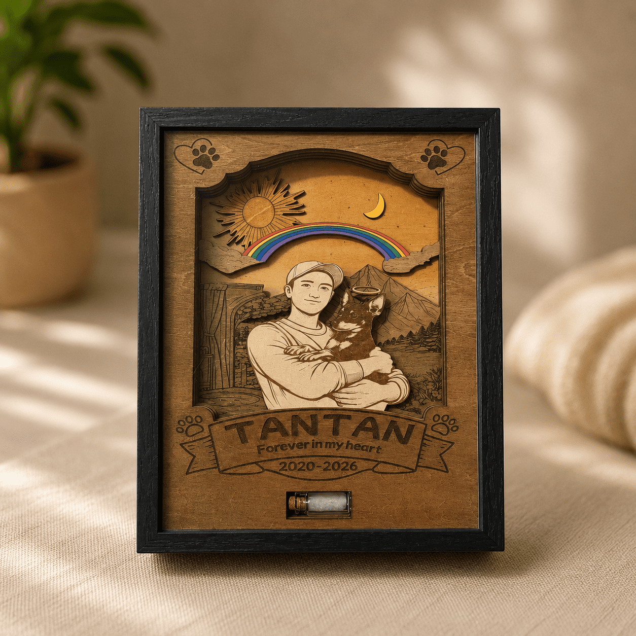 Personalized wooden pet memorial shadow box featuring an engraved portrait of a person holding a dog beneath a rainbow bridge, with memorial text and a fur keepsake vial.